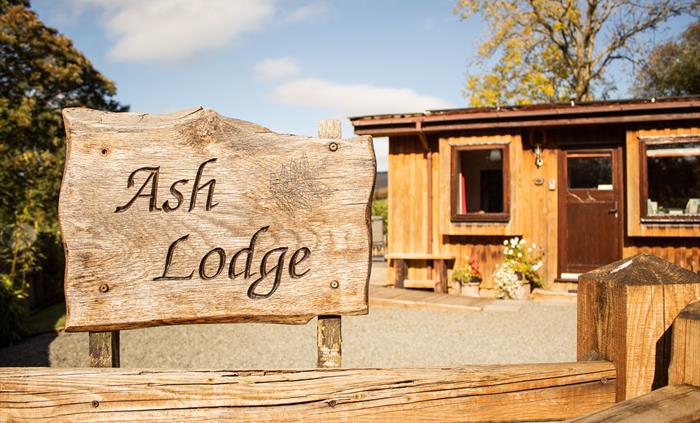 Ash Lodge entrance with a fenced and secure parking up to 3 cars.